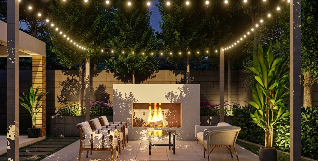 A cozy outdoor space features a glowing fireplace surrounded by illuminated seating and greenery